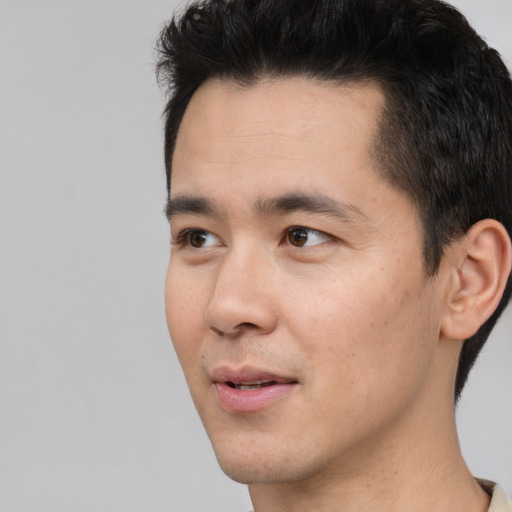 Neutral asian young-adult male with short  black hair and brown eyes