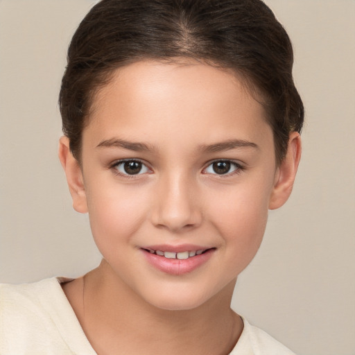 Joyful white child female with short  brown hair and brown eyes