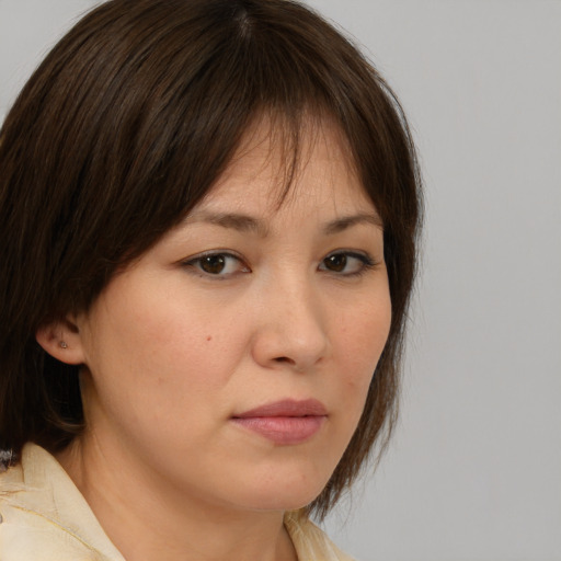Neutral white young-adult female with medium  brown hair and brown eyes