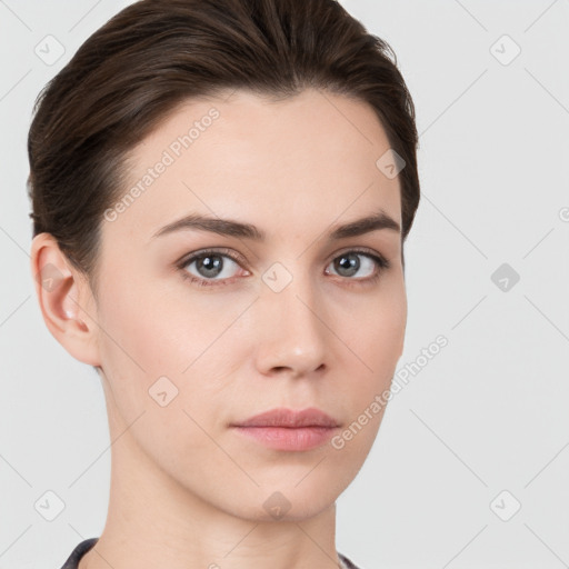 Neutral white young-adult female with short  brown hair and brown eyes