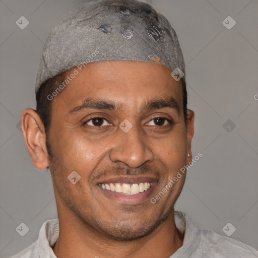 Joyful latino young-adult male with short  brown hair and brown eyes