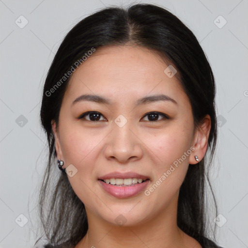 Joyful asian young-adult female with medium  brown hair and brown eyes