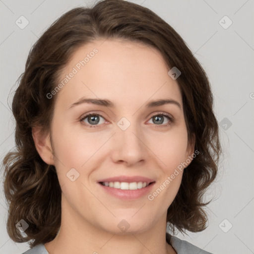 Joyful white young-adult female with medium  brown hair and green eyes