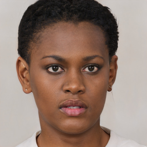Neutral black young-adult female with short  black hair and brown eyes