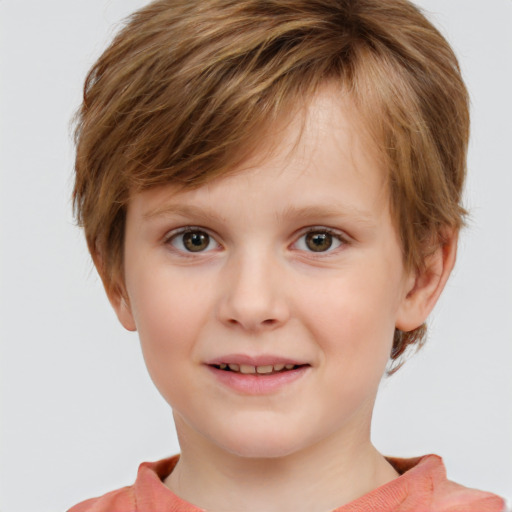 Joyful white child male with short  brown hair and grey eyes