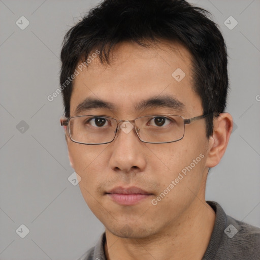 Neutral asian young-adult male with short  black hair and brown eyes