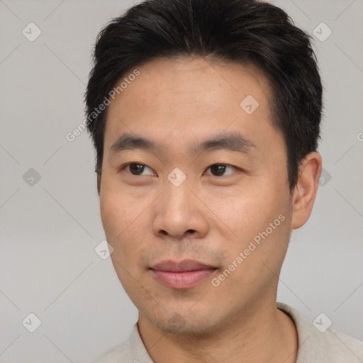 Neutral asian young-adult male with short  black hair and brown eyes