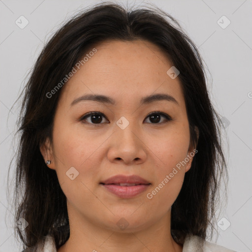 Joyful asian young-adult female with medium  brown hair and brown eyes