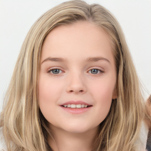 Joyful white child female with long  brown hair and brown eyes