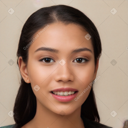 Joyful white young-adult female with long  black hair and brown eyes