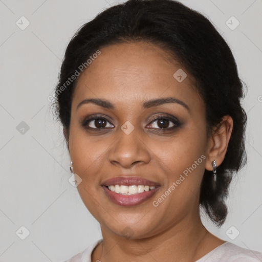 Joyful black young-adult female with medium  brown hair and brown eyes