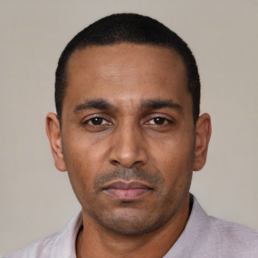 Neutral black adult male with short  black hair and brown eyes