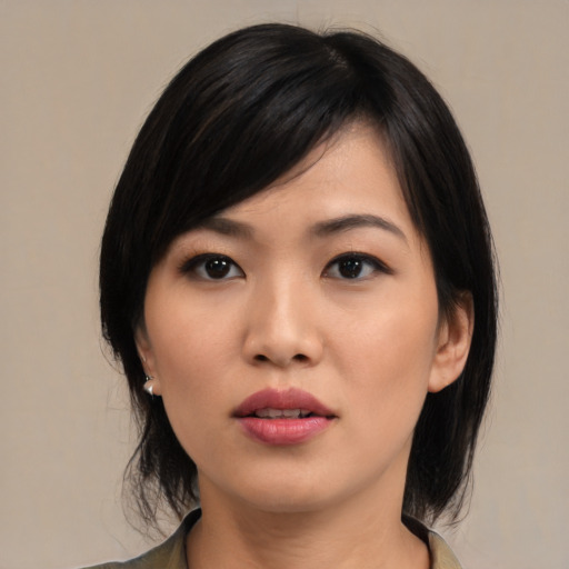 Neutral asian young-adult female with medium  black hair and brown eyes