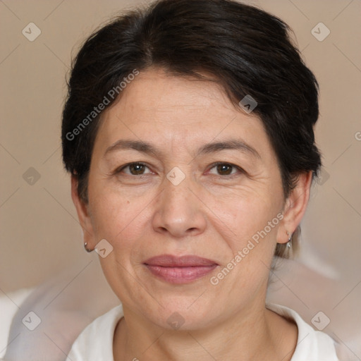 Joyful white adult female with short  brown hair and brown eyes