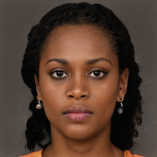 Neutral black young-adult female with long  black hair and brown eyes