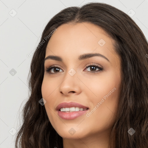 Joyful latino young-adult female with long  brown hair and brown eyes