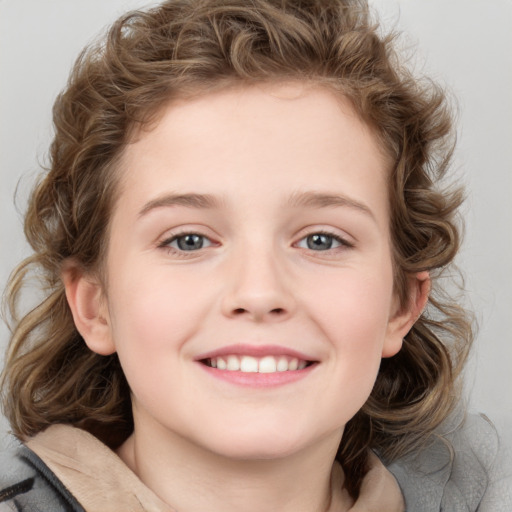 Joyful white child female with medium  brown hair and grey eyes