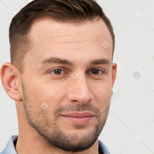 Joyful white young-adult male with short  brown hair and grey eyes