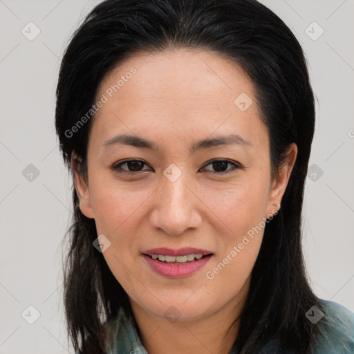 Joyful asian young-adult female with long  brown hair and brown eyes