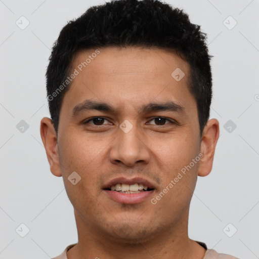 Joyful asian young-adult male with short  brown hair and brown eyes