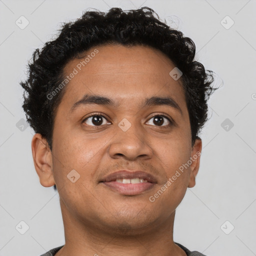 Joyful latino young-adult male with short  brown hair and brown eyes