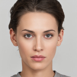 Neutral white young-adult female with short  brown hair and brown eyes