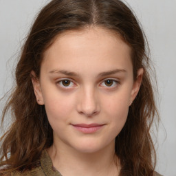 Joyful white child female with medium  brown hair and brown eyes