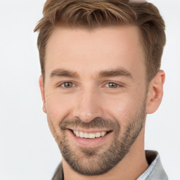 Joyful white young-adult male with short  brown hair and brown eyes