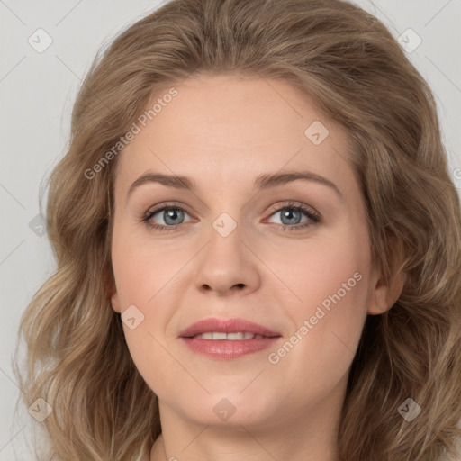 Joyful white young-adult female with long  brown hair and green eyes