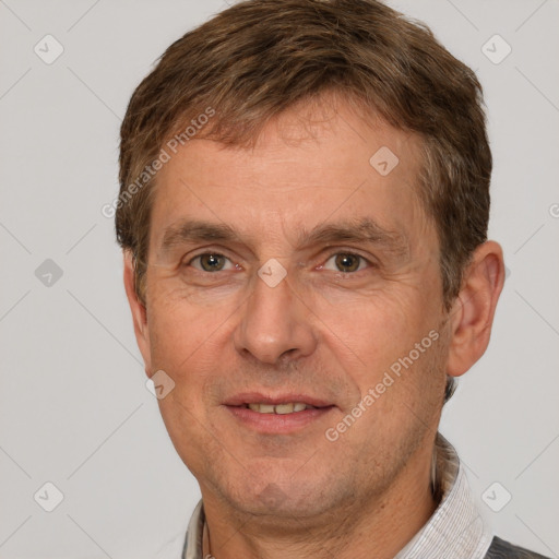 Joyful white adult male with short  brown hair and grey eyes