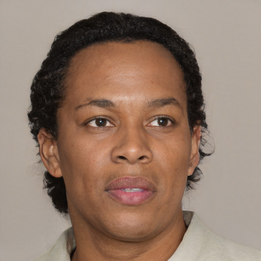 Neutral black adult female with short  brown hair and brown eyes