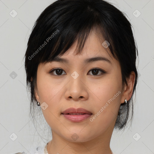 Joyful asian young-adult female with medium  brown hair and brown eyes