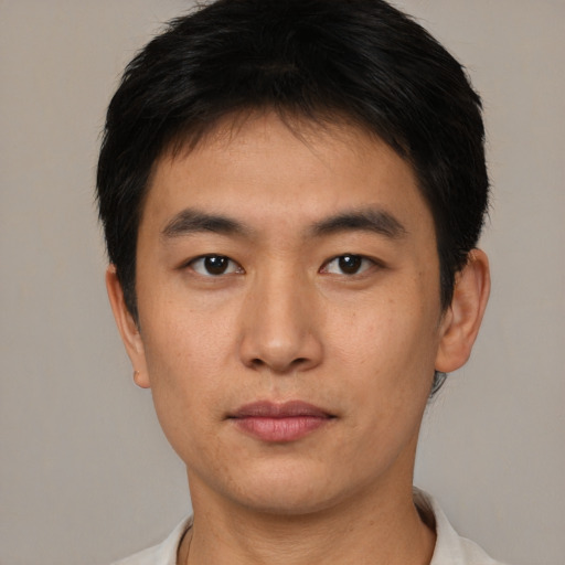 Neutral asian young-adult male with short  brown hair and brown eyes