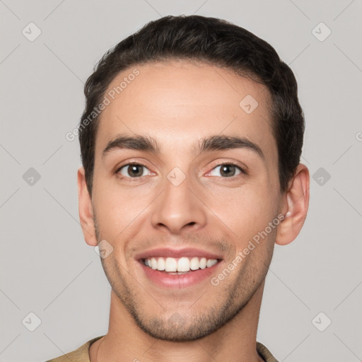 Joyful white young-adult male with short  brown hair and brown eyes