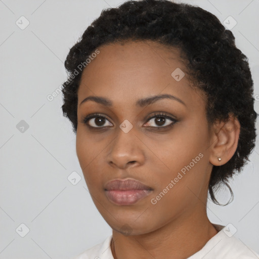 Neutral black young-adult female with short  black hair and brown eyes