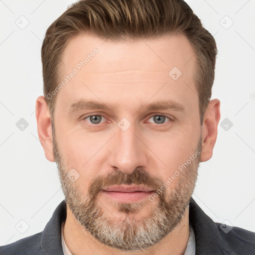 Joyful white adult male with short  brown hair and grey eyes