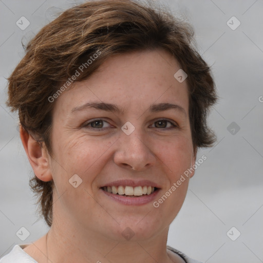 Joyful white adult female with short  brown hair and brown eyes