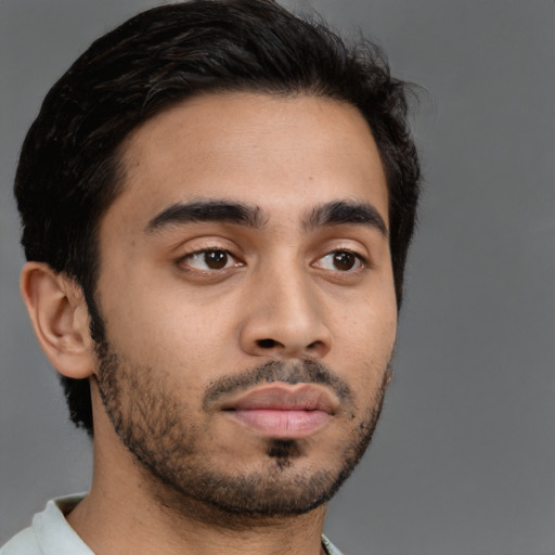 Neutral latino young-adult male with short  black hair and brown eyes