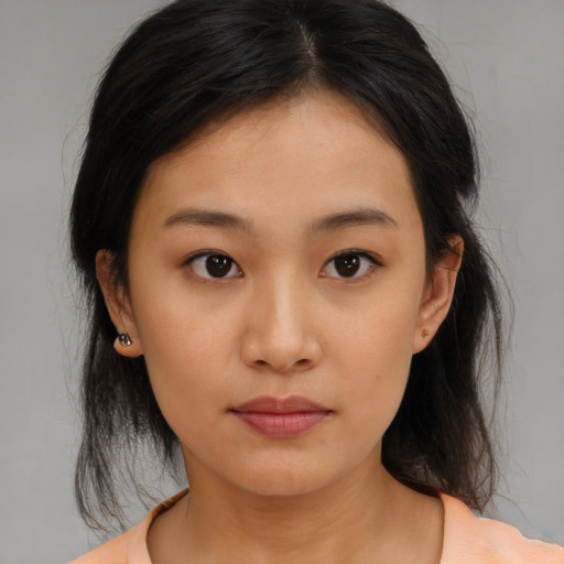 Neutral asian young-adult female with medium  brown hair and brown eyes