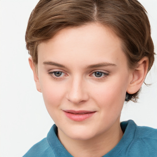 Joyful white child female with medium  brown hair and grey eyes