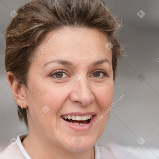 Joyful white adult female with short  brown hair and brown eyes