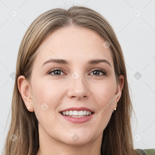 Joyful white young-adult female with long  brown hair and grey eyes