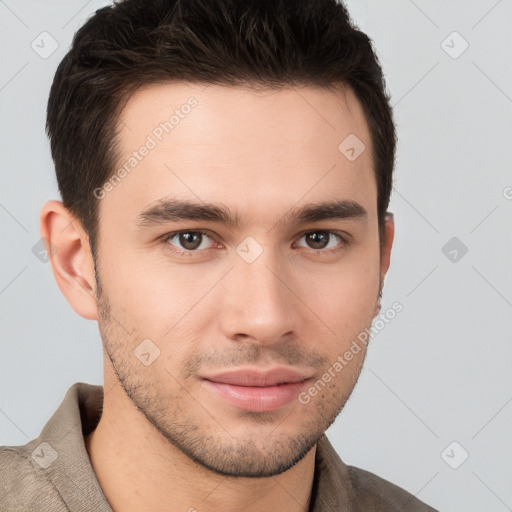 Neutral white young-adult male with short  brown hair and brown eyes