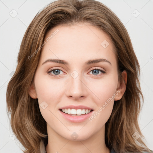 Joyful white young-adult female with long  brown hair and green eyes