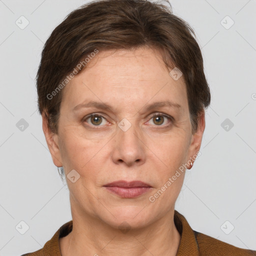 Joyful white adult female with short  brown hair and grey eyes