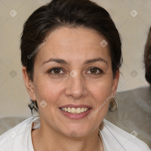 Joyful white adult female with short  brown hair and brown eyes