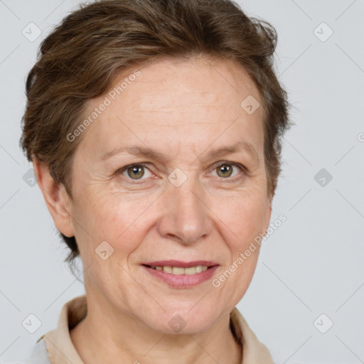 Joyful white adult female with short  brown hair and grey eyes