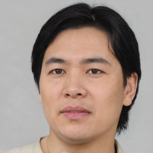 Neutral asian young-adult male with medium  black hair and brown eyes