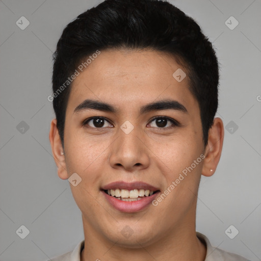 Joyful latino young-adult male with short  black hair and brown eyes