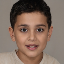 Joyful white child male with short  brown hair and brown eyes